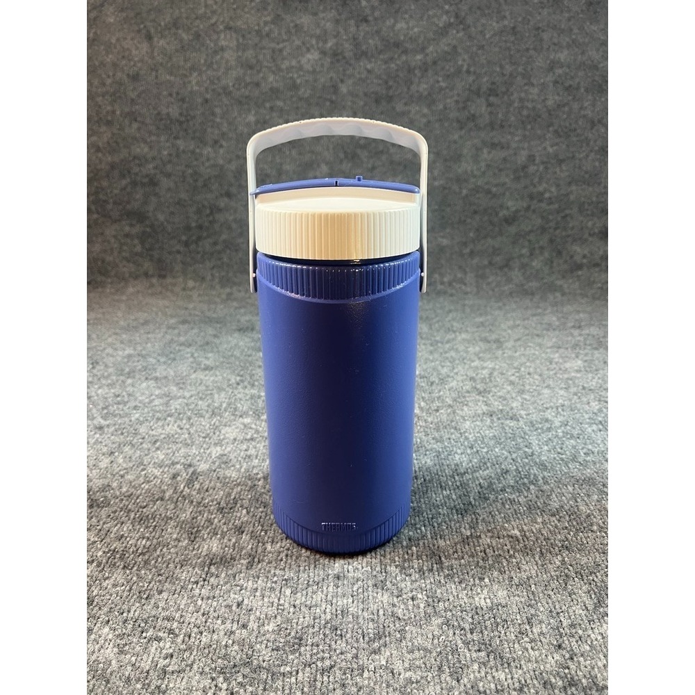 Vintage Thermos brand insulated plastic drink bottle with embossed "THERMOS"